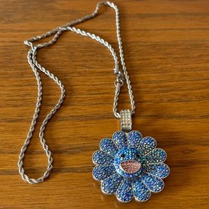 Fun sparkly charm on silver tone rope chain